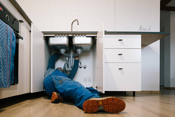 Professional Drain Cleaning technician working in Richmond, MO